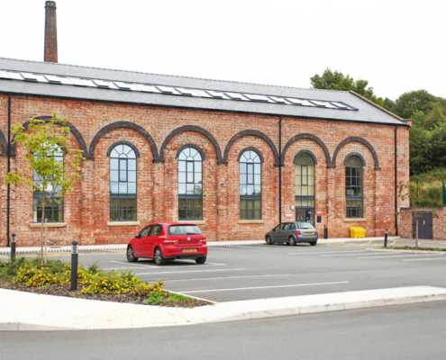 Guttercrest aluminium beaded deep flow guttering and traditional cast downpipes used on Oswestry Medical Centre 19th century building renovation