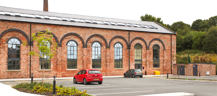 aluminium traditional round cast downpipes fitted railway building renovation