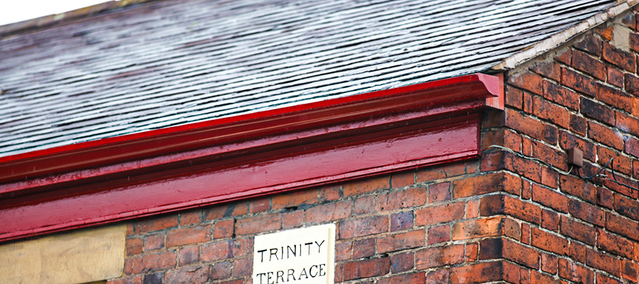 Red powder coated aluminium victorian ogee guttering