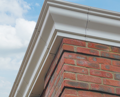 Bespoke aluminium guttering with external angle, Downs Edge