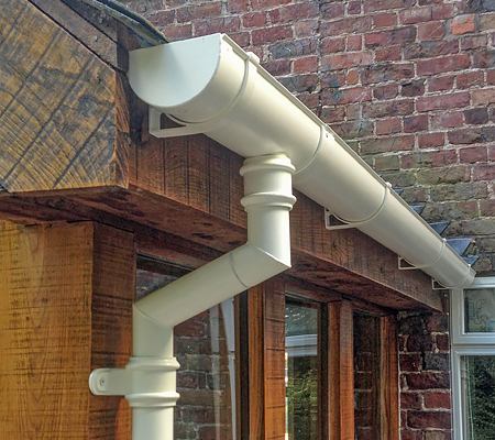 cream cast iron effect beaded deep flow guttering swan neck and tradition cast round downpipe