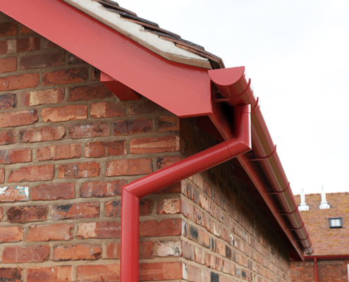 guttercrest aluminium smoothline flush fit joint downpipes fixed to garston barns