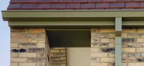 Aspire Guttering with Square Downpipe on Modern Brick Building | Guttercrest