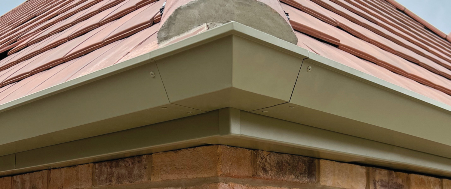 Aspire Aluminium Gutter Installed on Modern Brick Building | Guttercrest